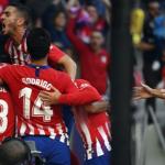 Jugadores celebran un gol / Atlético