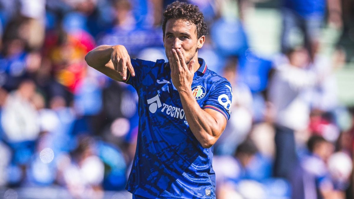 Luis Milla celebrates a goal scored with Getafe