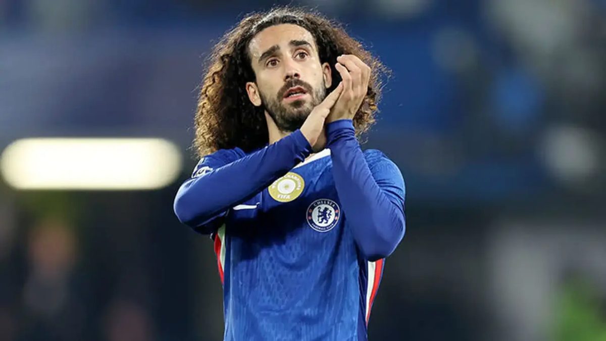 Marc Cucurella applauds Chelsea fans after a match