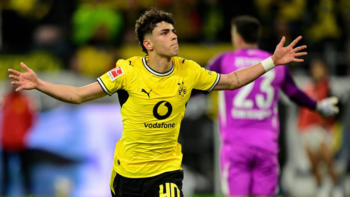 Samuele Inácio celebrates a goal with Borussia Dortmund