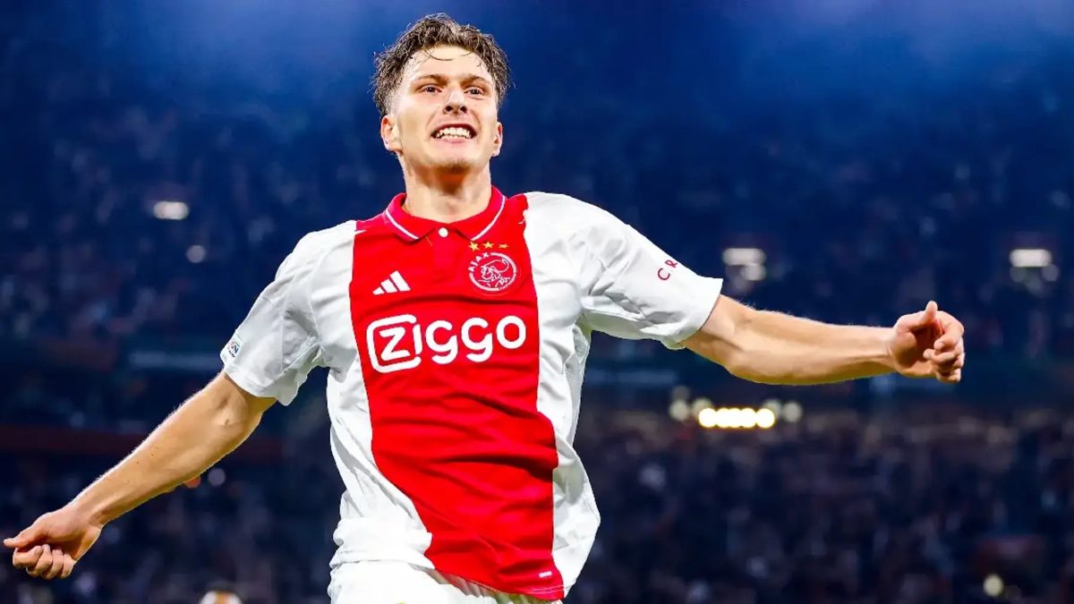 Mika Godts celebrates a goal with Ajax