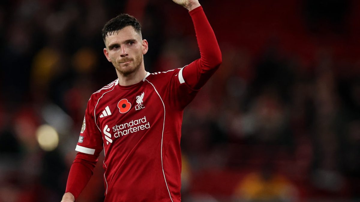 Andrew Robertson celebrates a goal scored with Liverpool