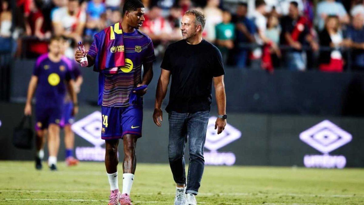 Hansi Flick and Marcus Rashford after a Barcelona match