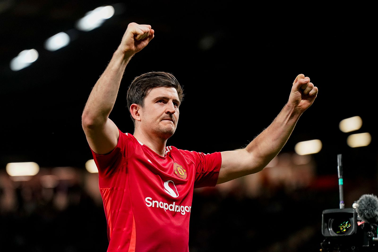 Harry Maguire celebrating victory with Manchester United