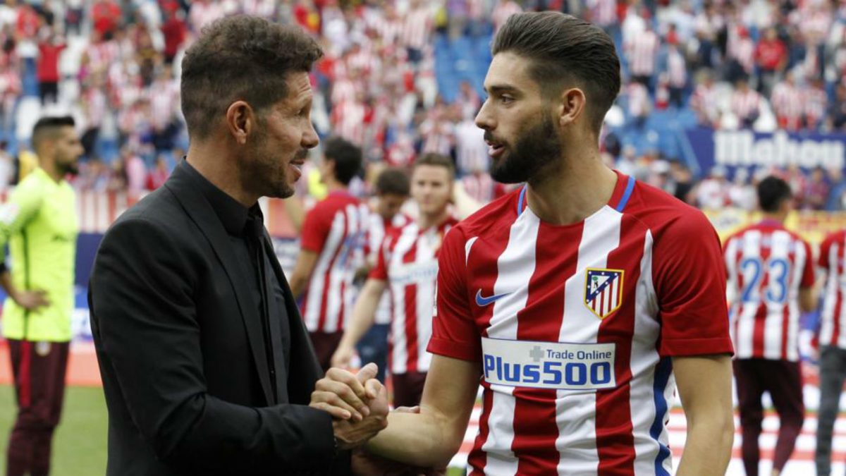 Yannick Carrasco junto al Cholo Simeone