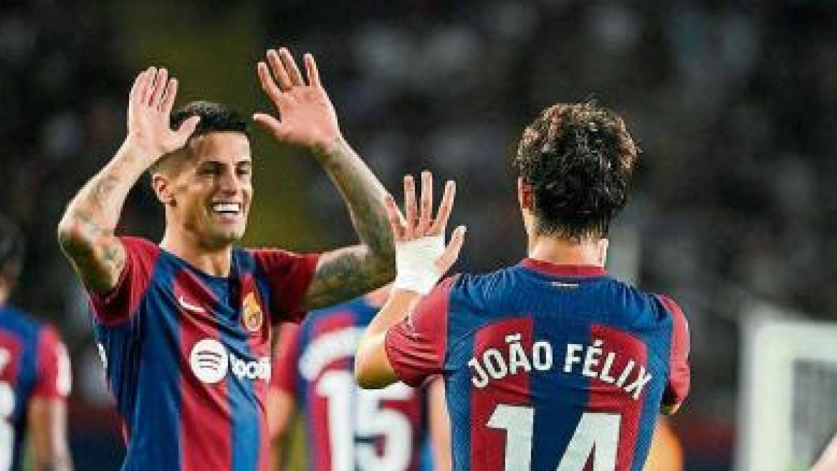 Joao Felix y Joao Cancelo