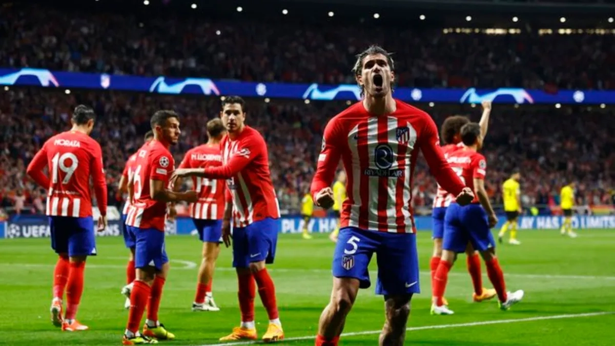 <p>Atlético de Madrid players celebrate a goal</p>