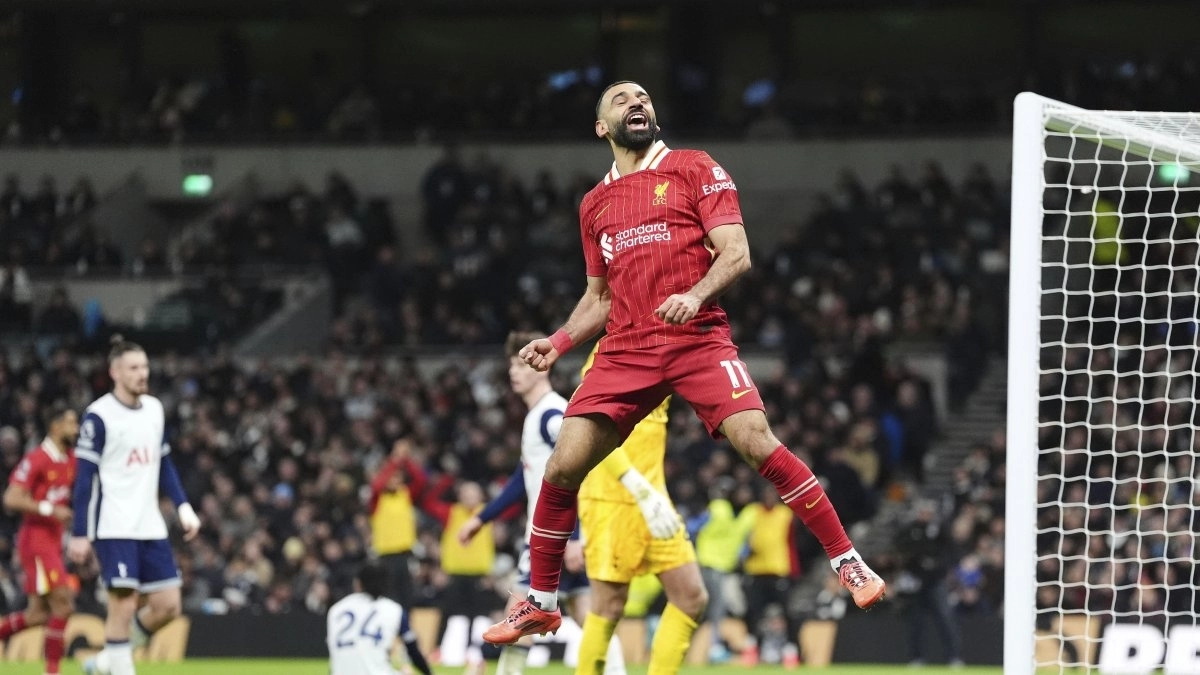 <p>Mohamed Salah celebrates a goal with Liverpool</p>