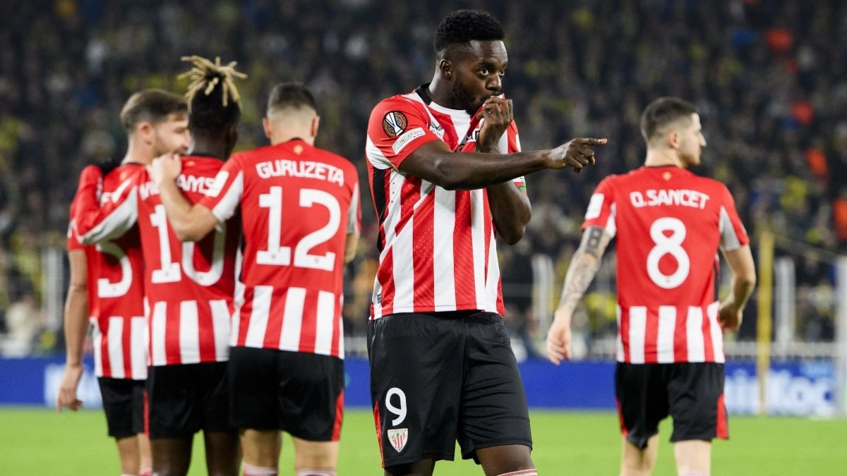 Athletic Club players celebrate a goal.