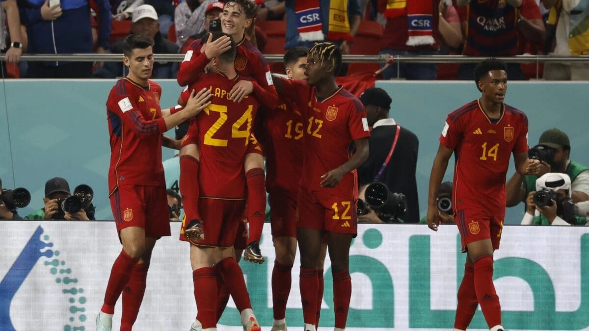 Spanish players celebrate a goal.