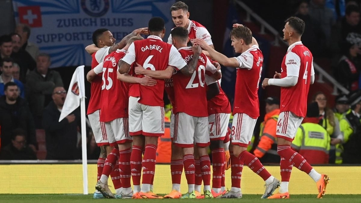 The Arsenal players celebrate a goal.