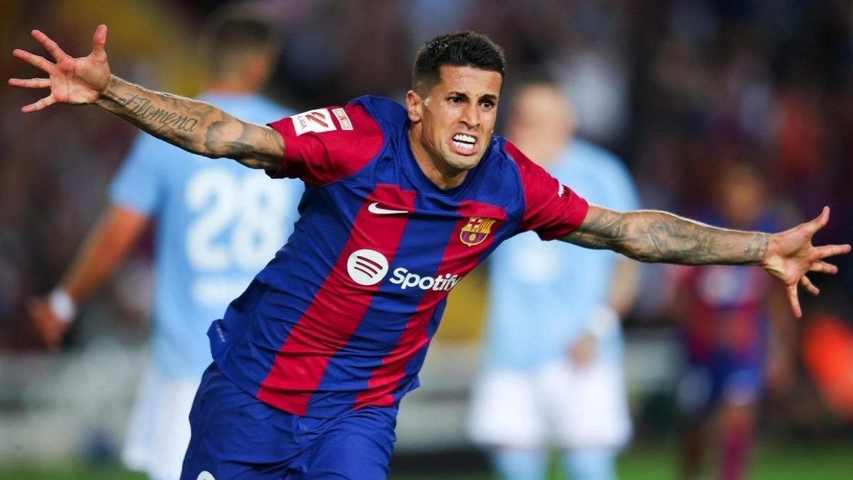Joao Cancelo celebrates a goal scored with Barcelona