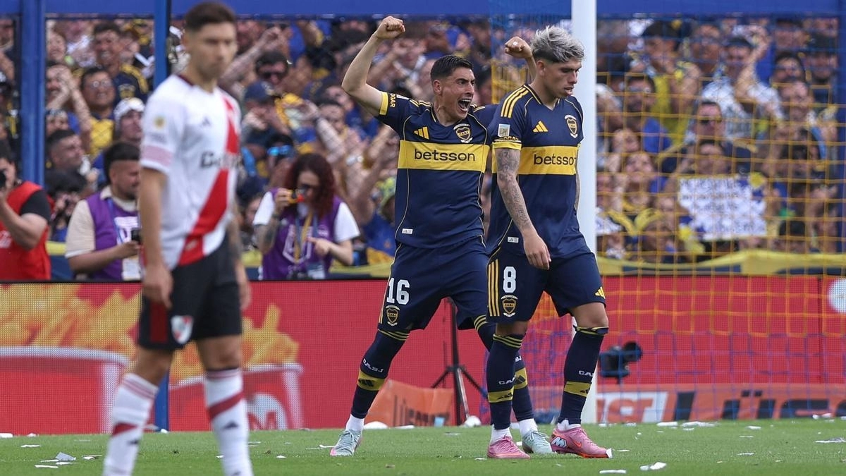 Boca Juniors players celebrate a goal against River Plate