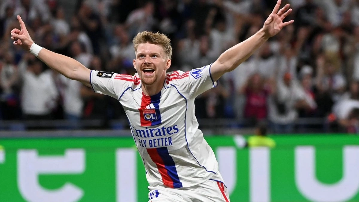 <p>Pavel Sulc celebrates a goal scored with Olympique de Lyon</p>