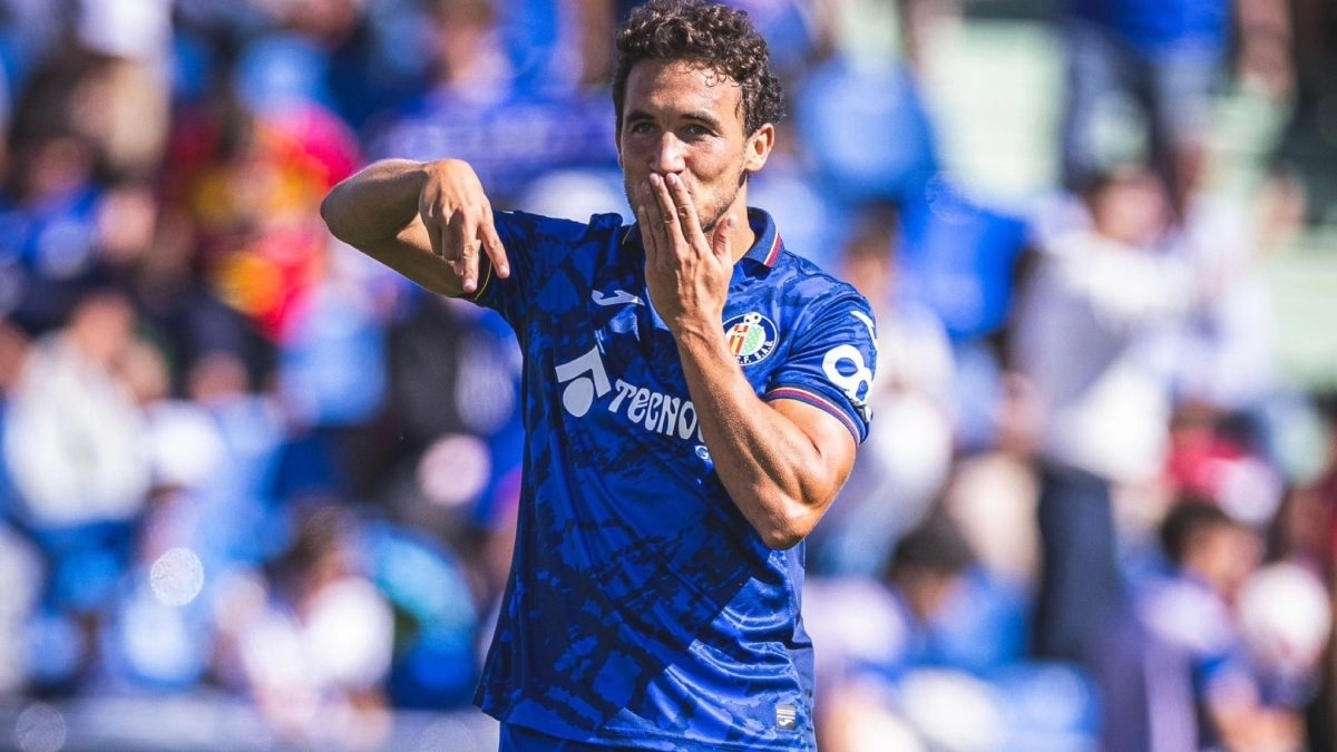 Luis Milla celebra un gol anotado con el Getafe