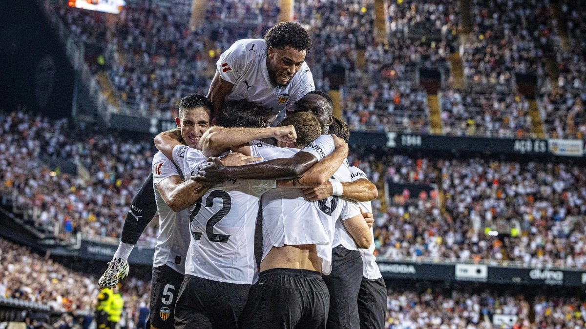 Valencia players celebrate a goal