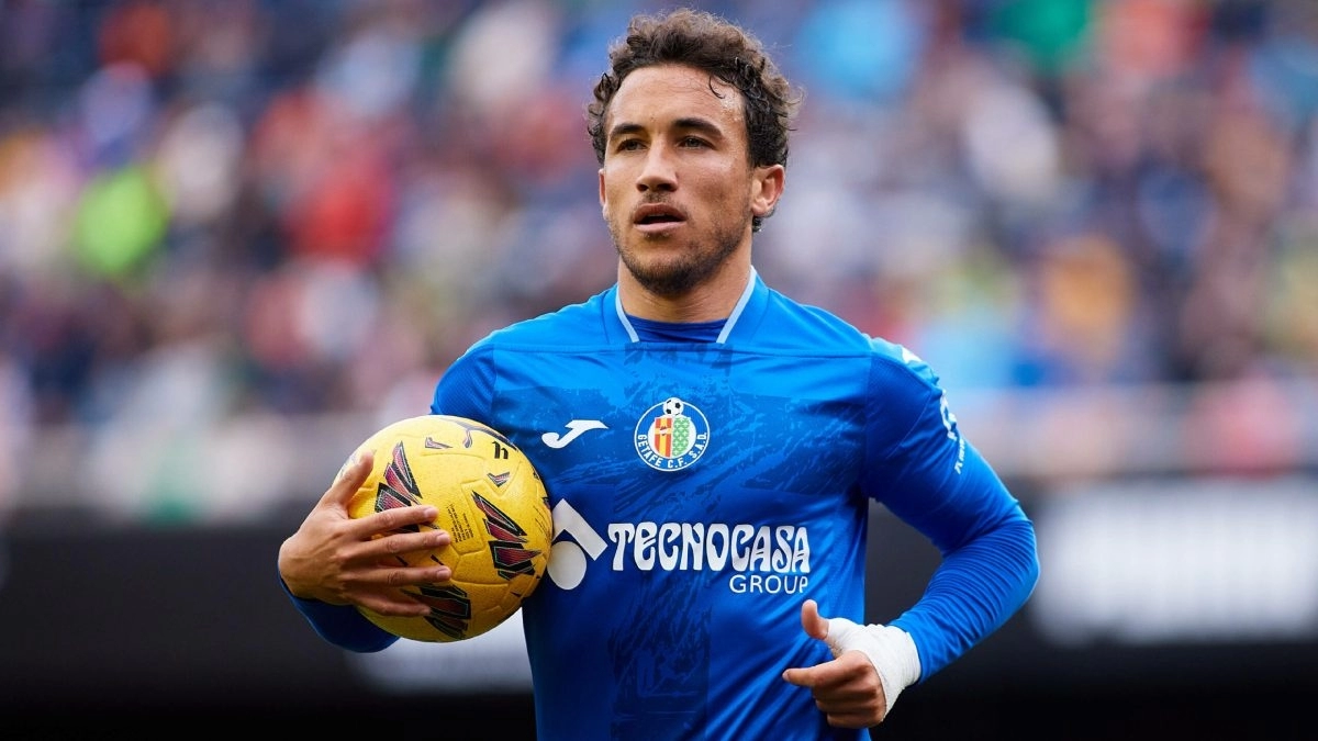 Luis Milla durante un partido con el Getafe