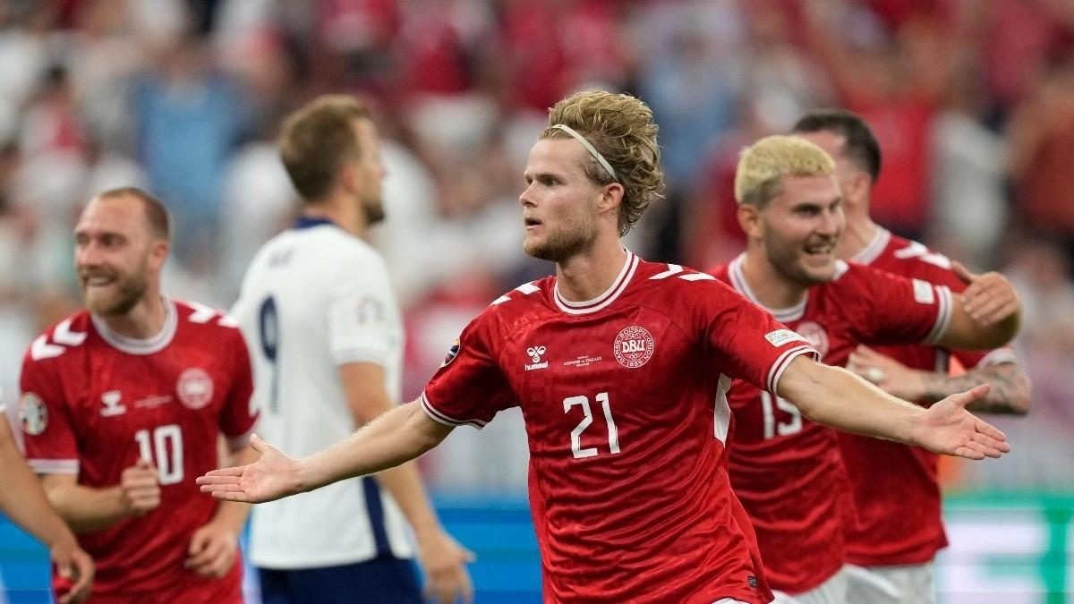 Morten Hjulmand celebrates a goal scored with the Denmark national team.