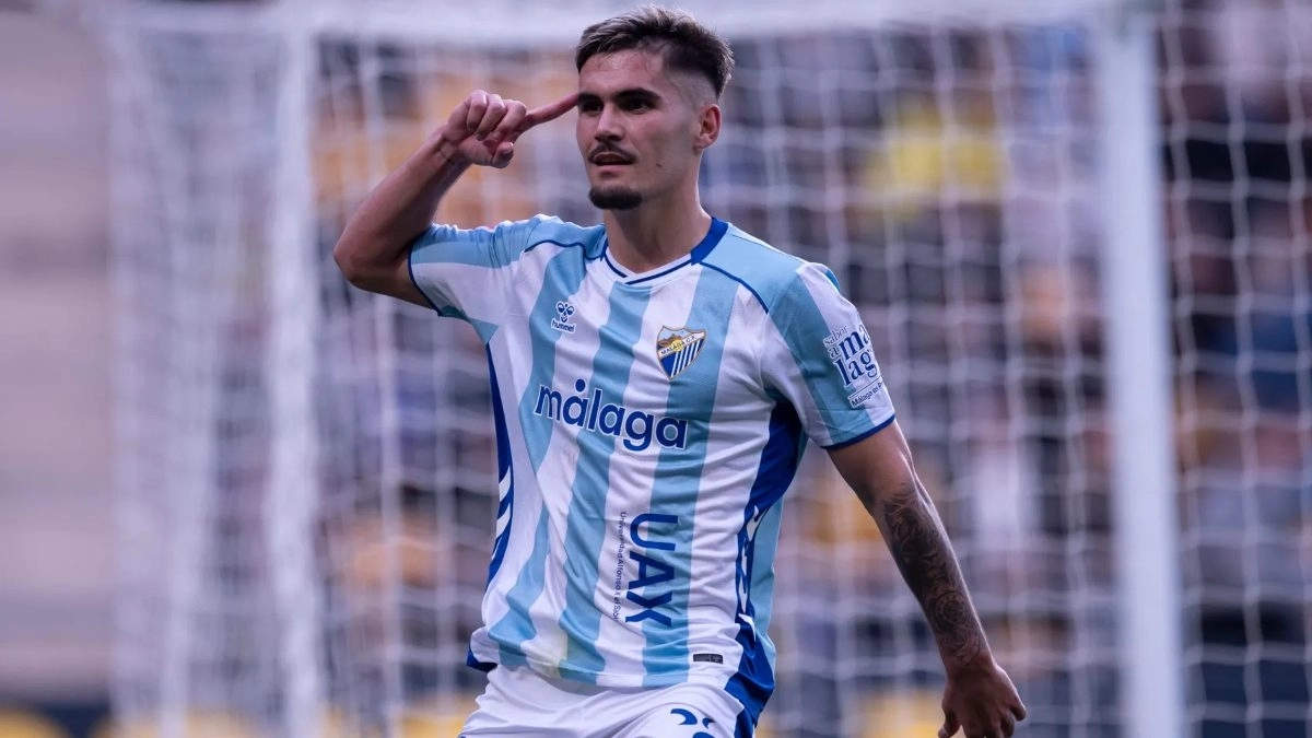 Chupe celebra un gol anotado con el Málaga