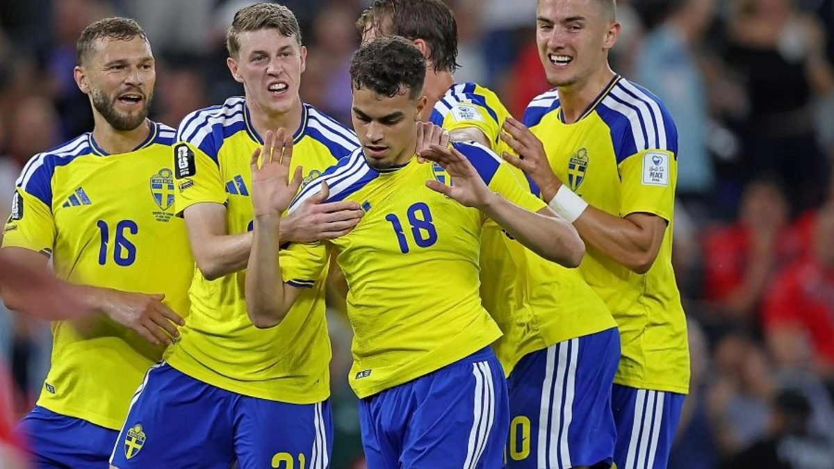 Yasin Ayari celebrates a goal scored in the World Cup with Sweden