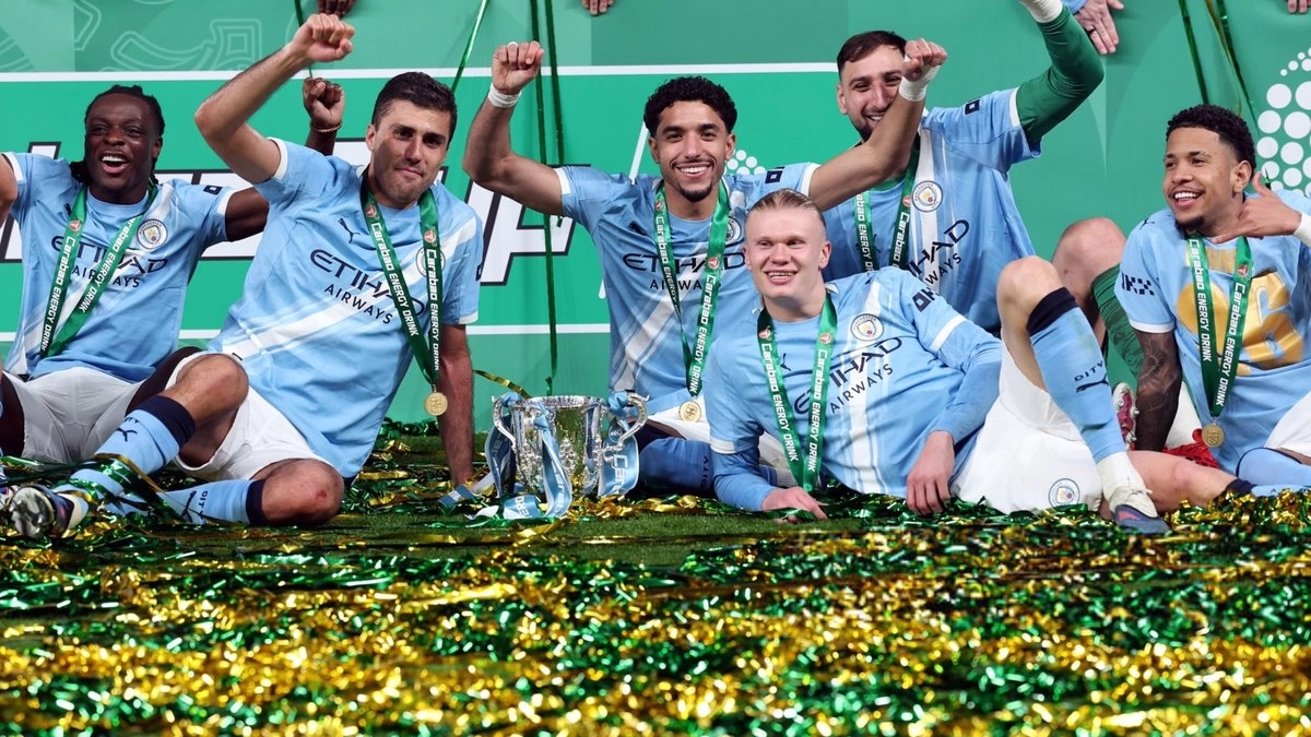 The Manchester City players celebrate the EFL Cup / Getty Images