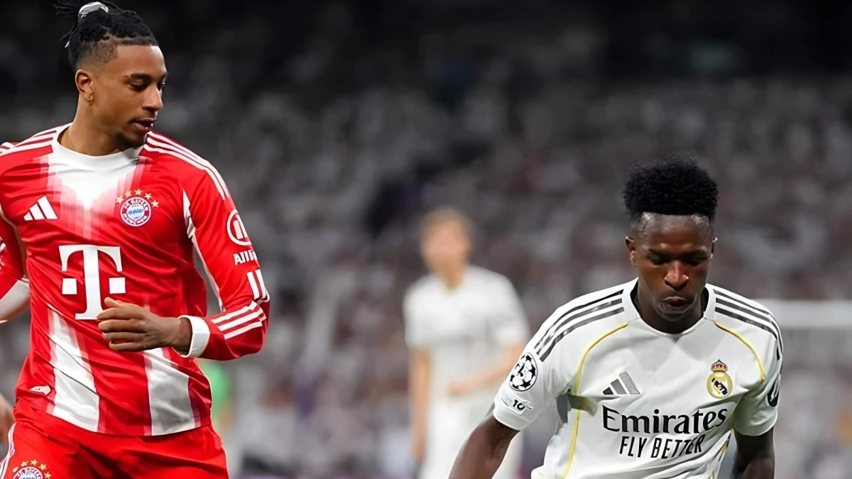 Vinicius y Michael Olise, en el Real Madrid-Bayern del curso pasado / Getty Images