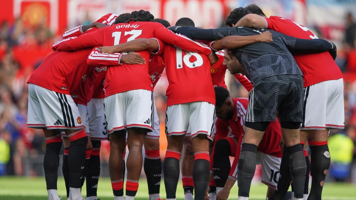 Los jugadores del Manchester United, antes de un partido / AFP