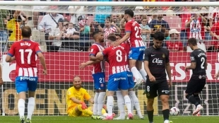Girona players celebrate a goal against Mallorca