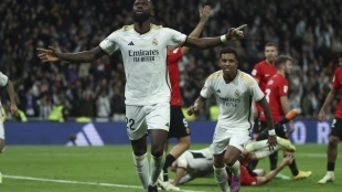 The Real Madrid players, including Rodrygo, celebrate a goal.