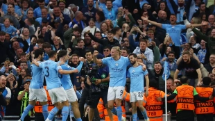 The Manchester City players celebrate a goal