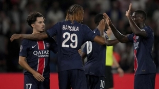 The PSG players celebrate a goal.