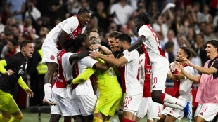 The Ajax players celebrate a goal.
