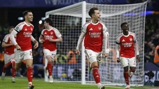 The Arsenal players celebrate a goal