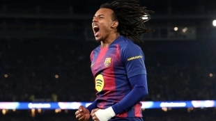 <p>Jules Koundé celebrates a goal scored with Barcelona</p>